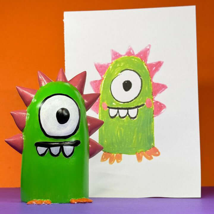 Custom figurine made from a child’s drawing of a green, spiky monster. Unique personalized gift, hand-crafted with creativity and magic.