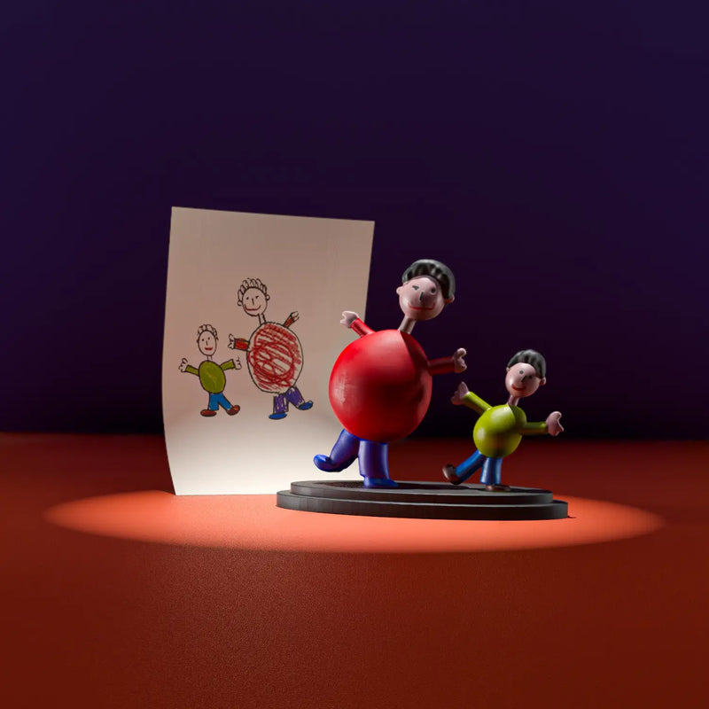 Father and son figurine duo crafted from a child’s drawing, showing their playful poses and matching smiles.
